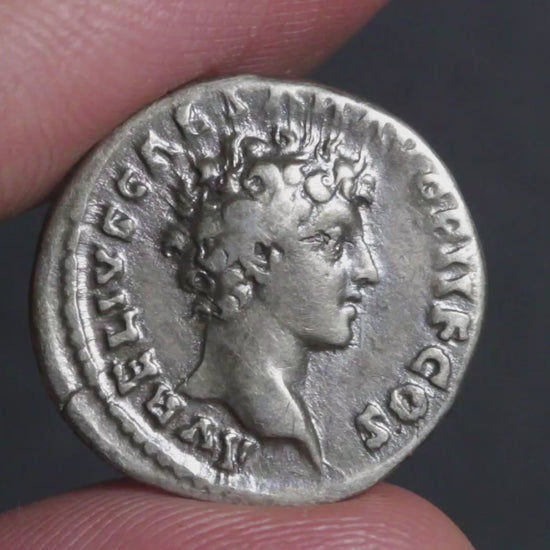 video of marcus aurelius antoninus pius denarius being rotated between fingers to show both sides