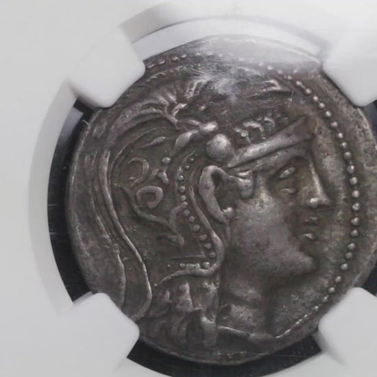 video showing the slabbed coin being rotated to display both sides