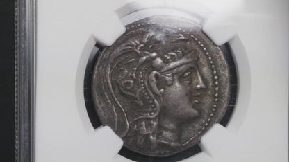 video showing the slabbed coin being rotated to display both sides